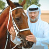Frank Heister (rechts) mit einem Pferd (links)